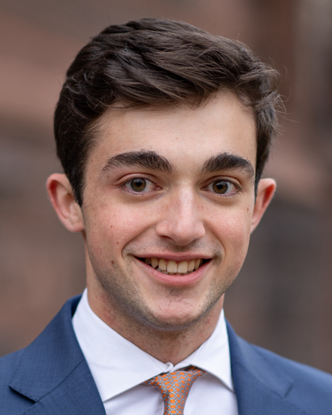 Tyler Bruno wearing a blue suit